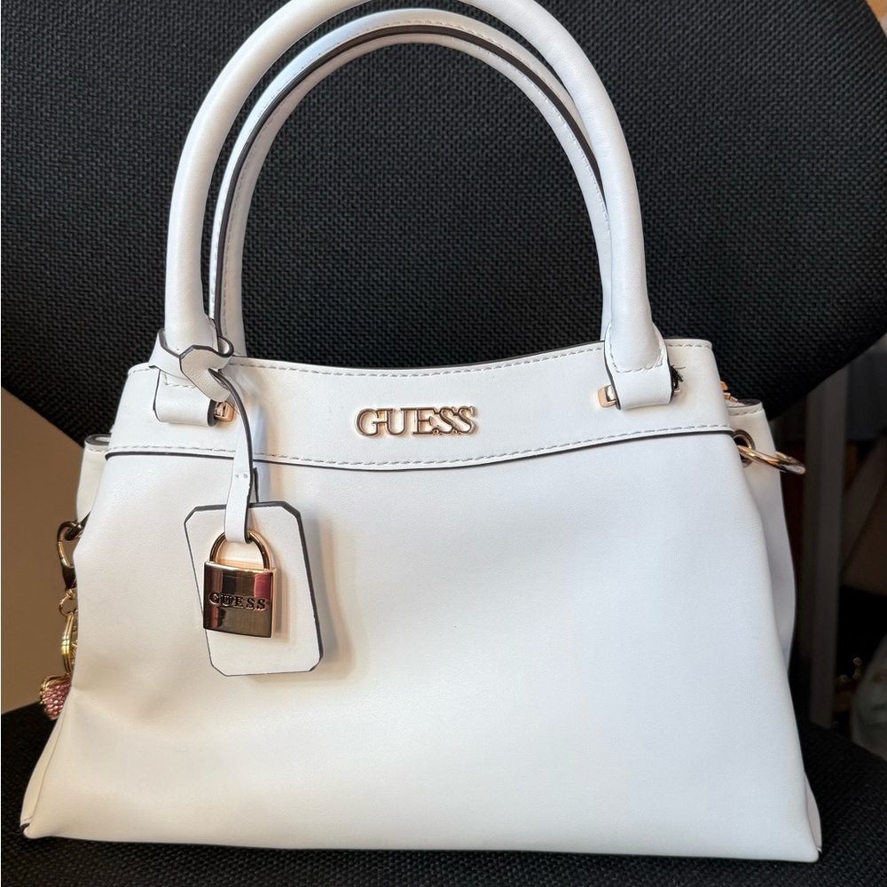 guess andela satchel in white faux leather with gold hardware